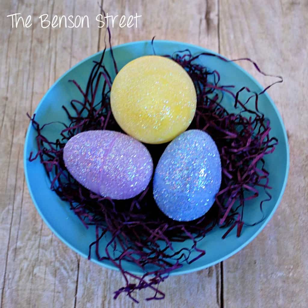 DIY Glitter Eggs in a blue bowl