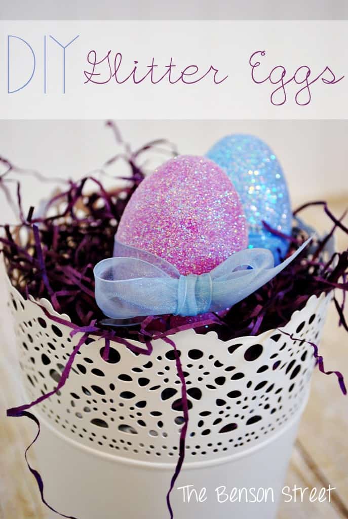 Two glittered eggs in a basket