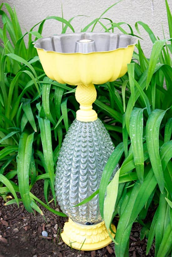 yellow-birdbath-in-yard