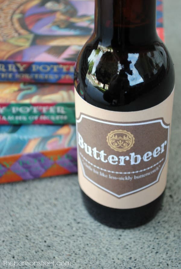 Close up of a butterbeer label printable on a glass bottle of root beer.