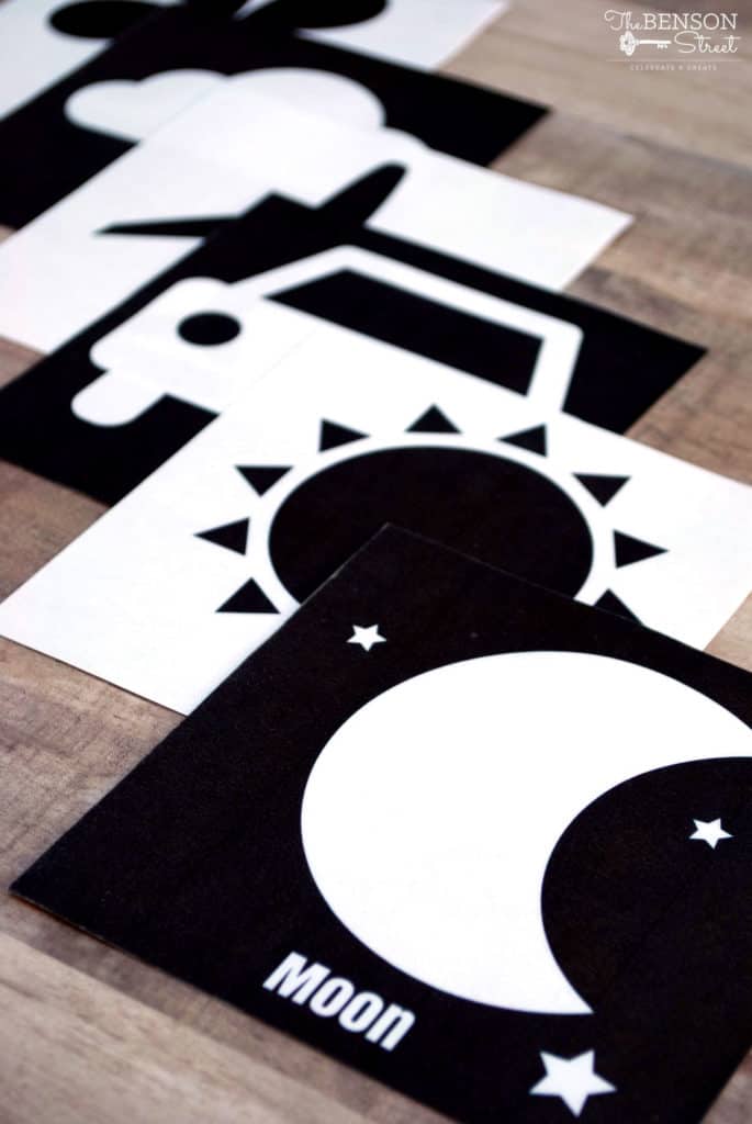 Stack of high contrast baby tummy time flash cards printed out