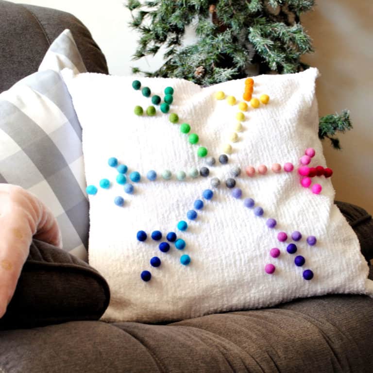 How to make a DIY Rainbow Snowflake Pillow for Winter