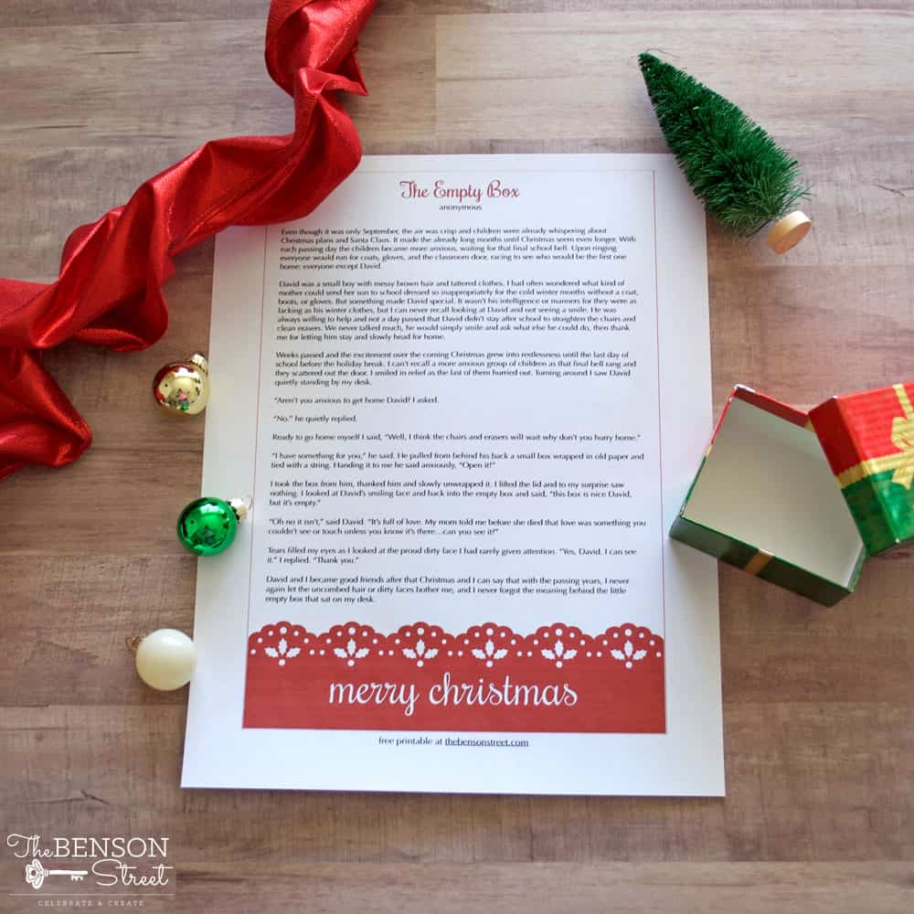 printed sheet with christmas story and decorations laid around it
