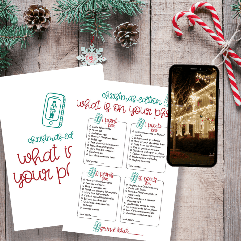 sheets of holiday game printed next to a phone
