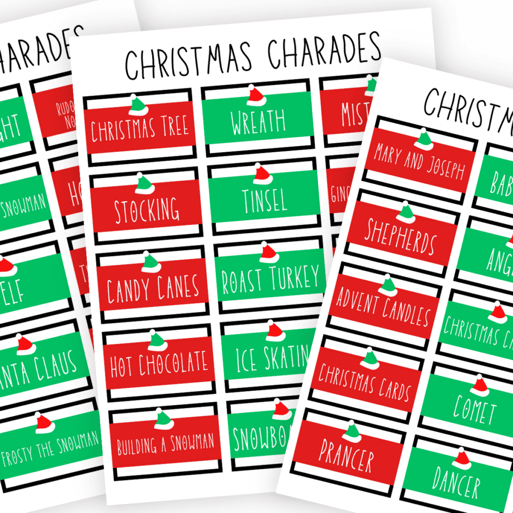 Fanned out sheets of Christmas Charades Cards