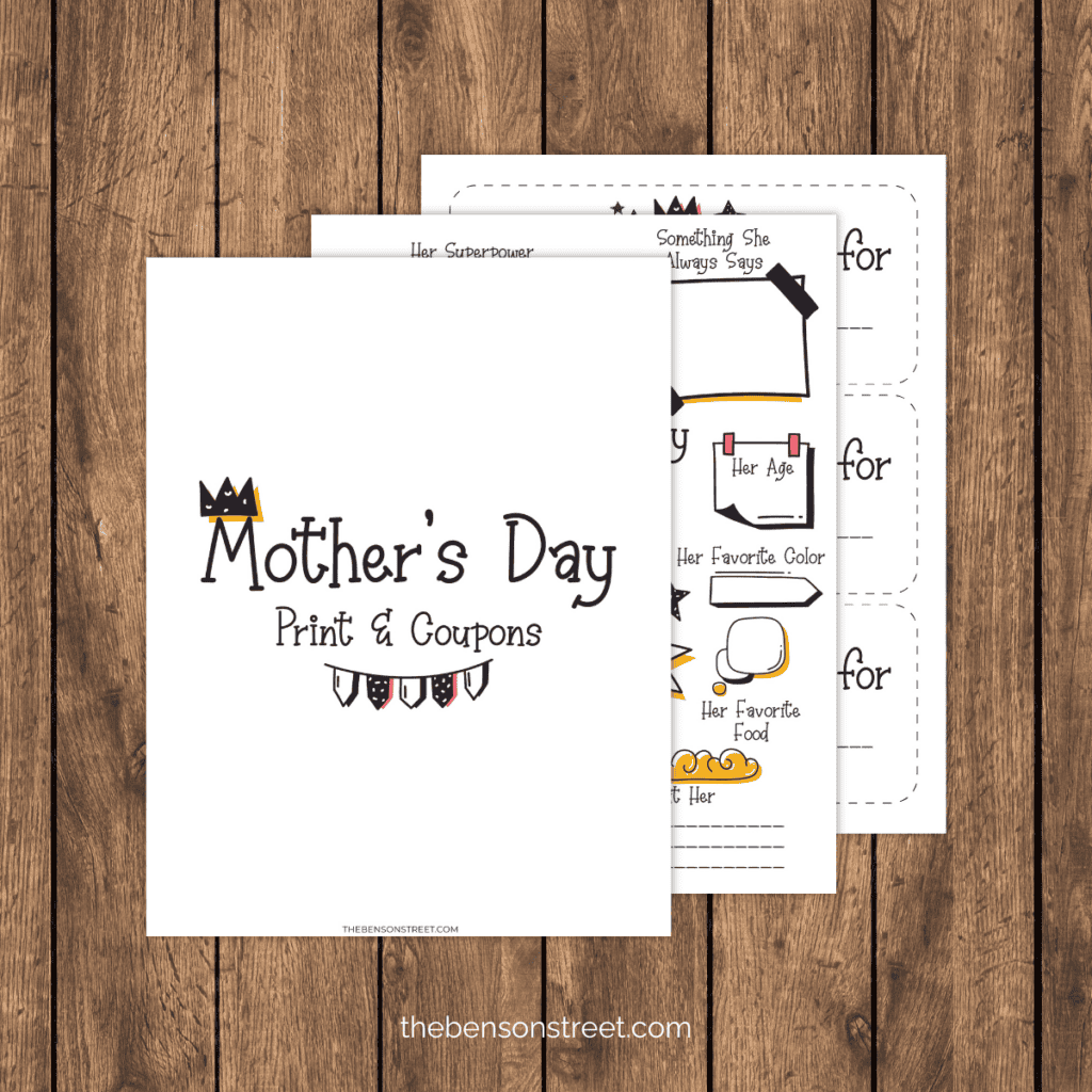 set of Mother's day printables laying on wood table.