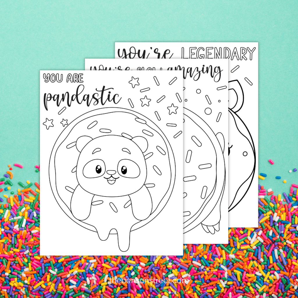 Three cute donut coloring pages in a stack on a background of sprinkles