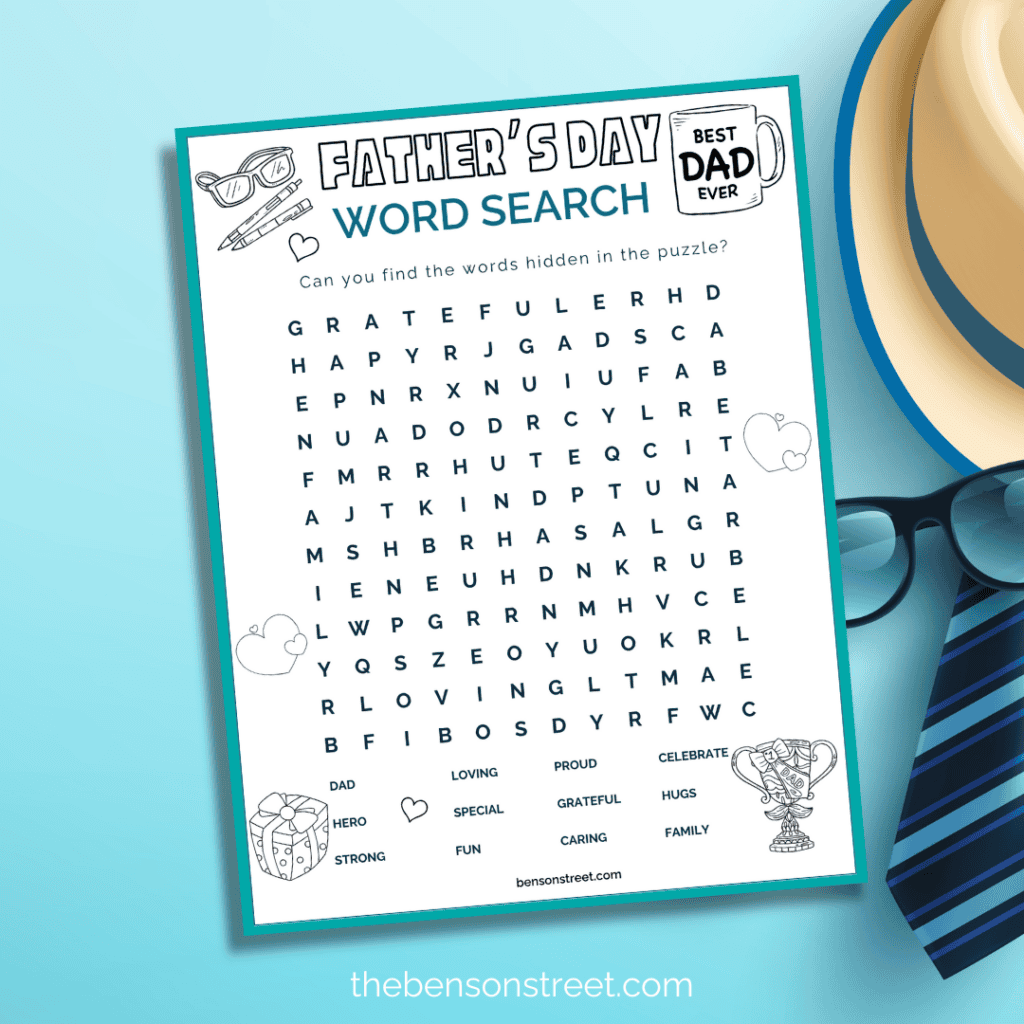 Creative flat lay composition of a Father's Day Word Search puzzle surrounded by Father's Day gifts and decorations.