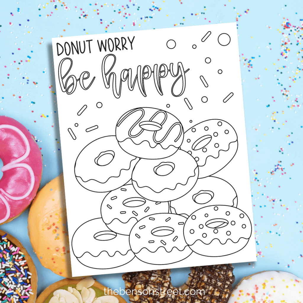 Donut worry be happy coloring page with a bunch of donuts in black and white to be colored in