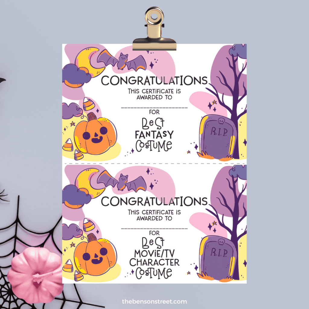 Clipboard with free printable Halloween costume awards.