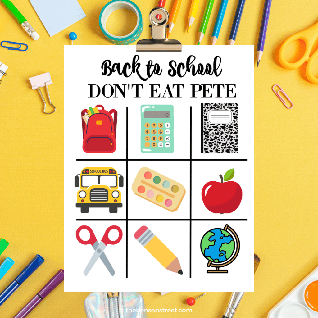 Colorful back-to-school Don't Eat Pete game board with markers" - Vibrant game board design featuring markers, rulers, and other school supplies.