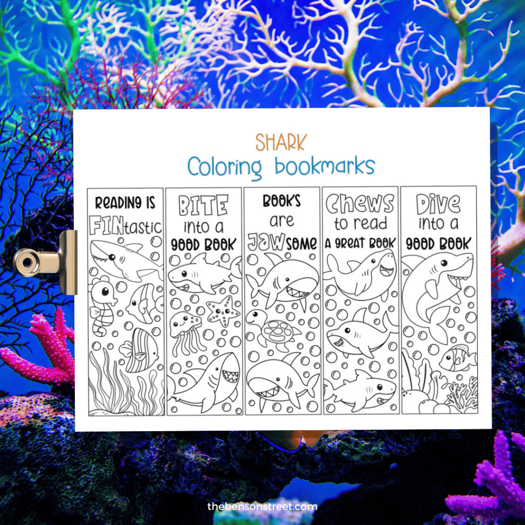 Clipboard with a page of shark coloring bookmarks.