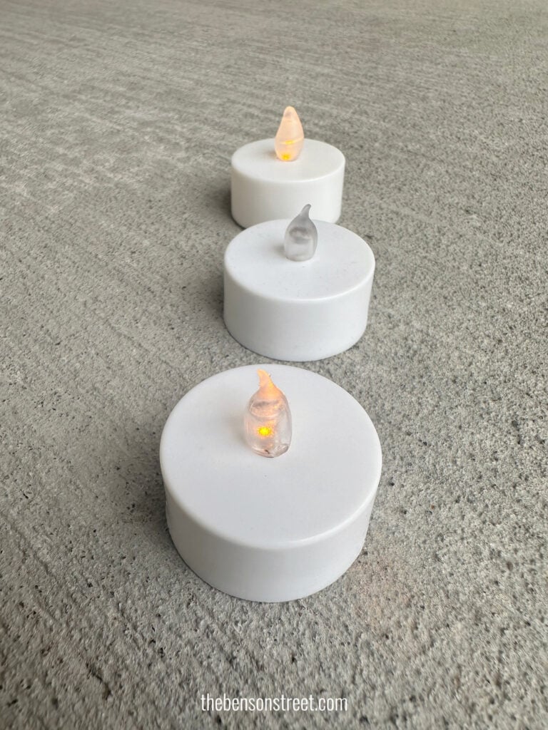 Three battery operated tea lights for lighting carved pumpkins.