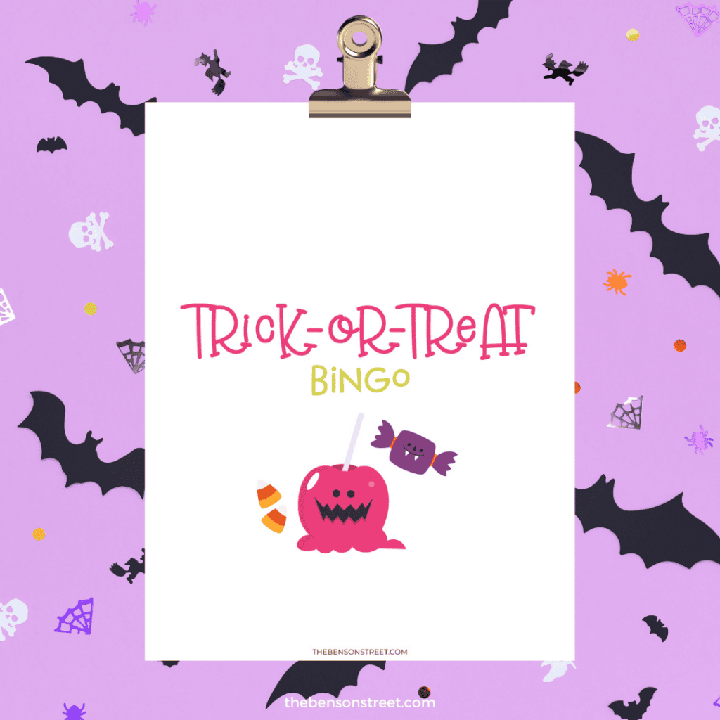 Trick or Treat Bingo Title Page on a clipboard with purple bat background