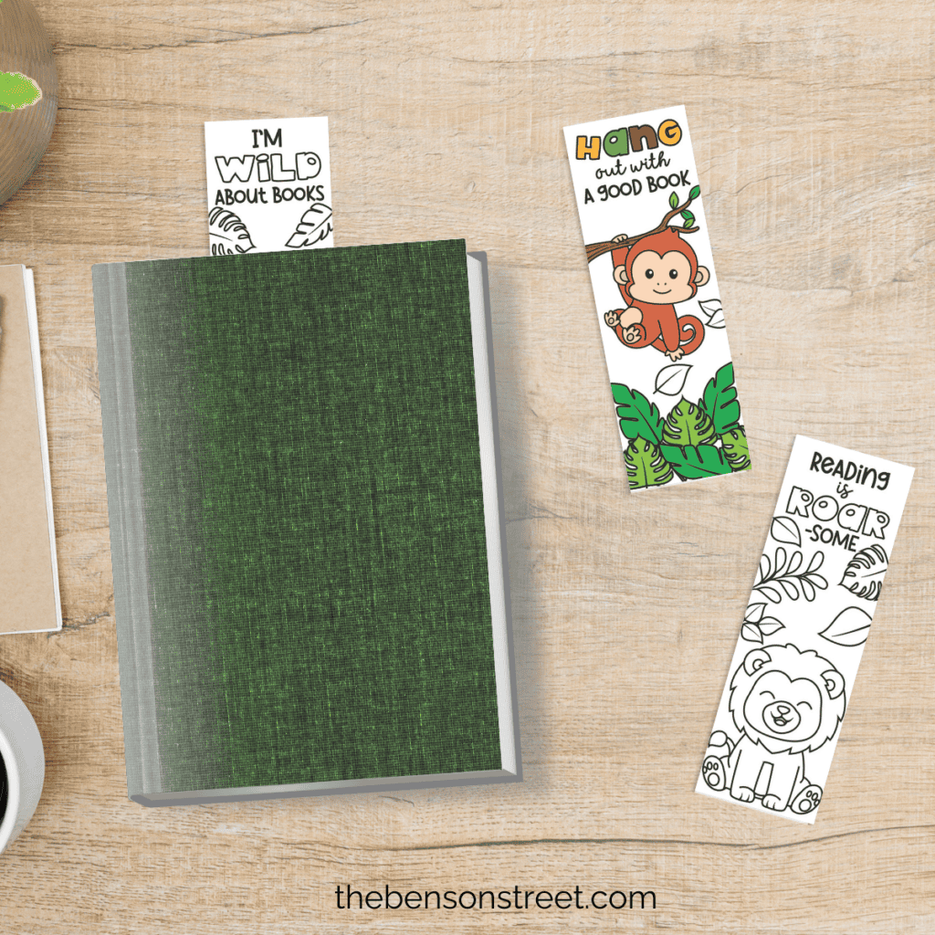 Close-up view of a printable safari animal bookmark showing a monkey colored in and a lion ready to be colored in.