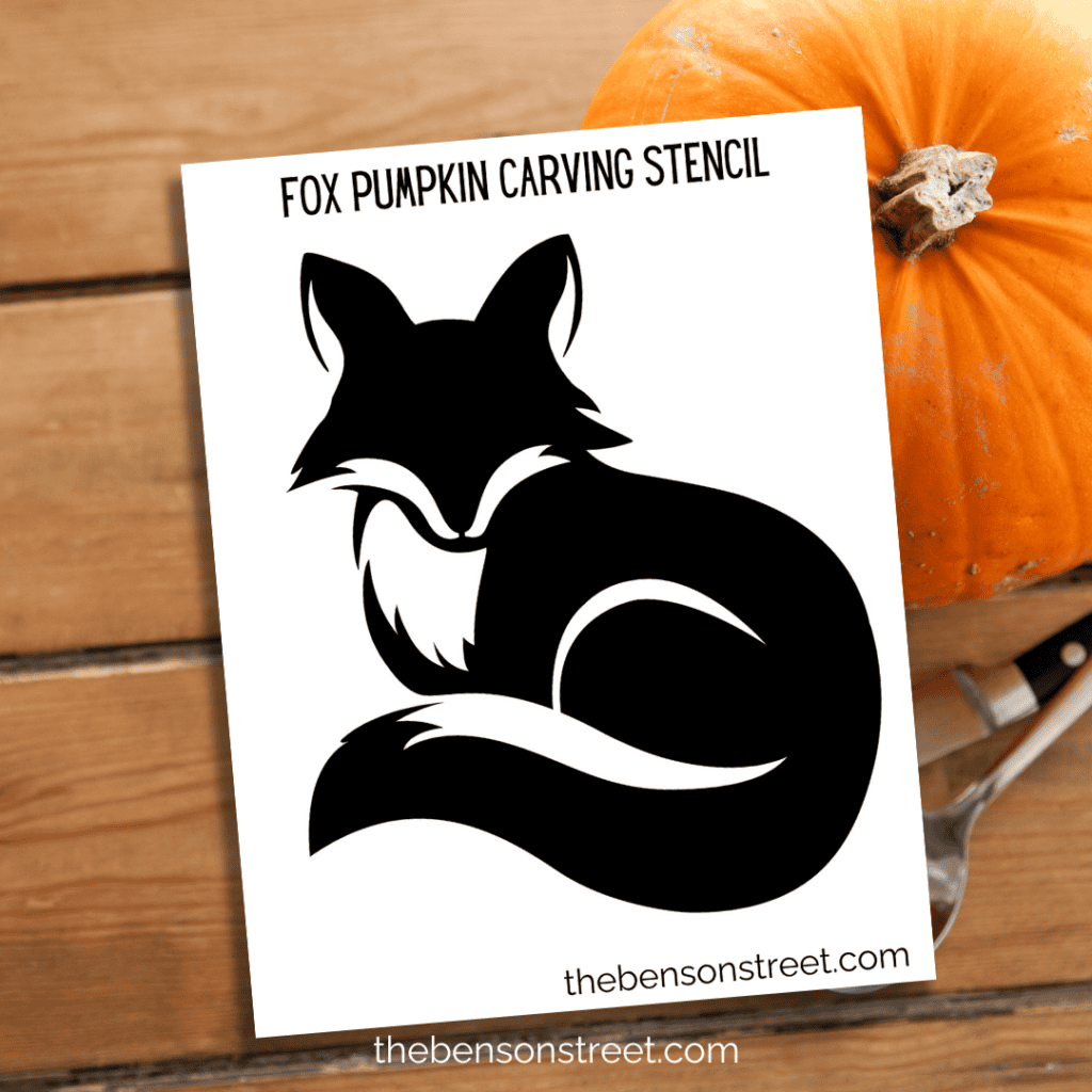 Printable fox pumpkin stencil featuring a simple outline of a fox’s head with pointed ears and an elegant snout.
