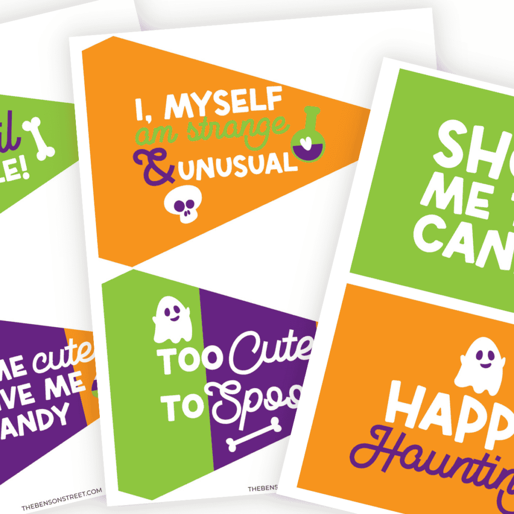 Three sheets of green, purple, and orange Halloween Flags with Halloween text.