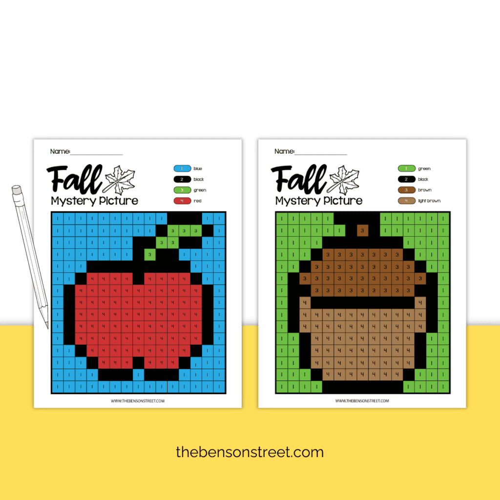 Two completed fall mystery picture color by number sheets filled in, an apple and an acorn.