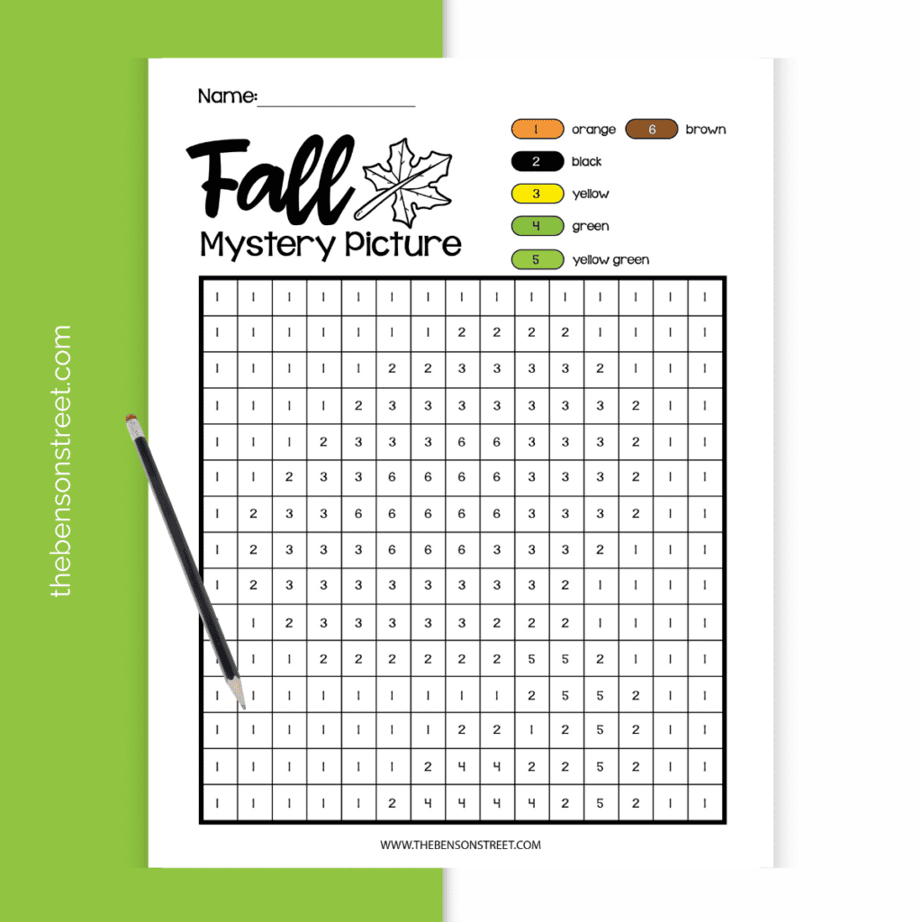 A blank fall mystery picture printable color by number grid ready to be filled in with a pencil on top.