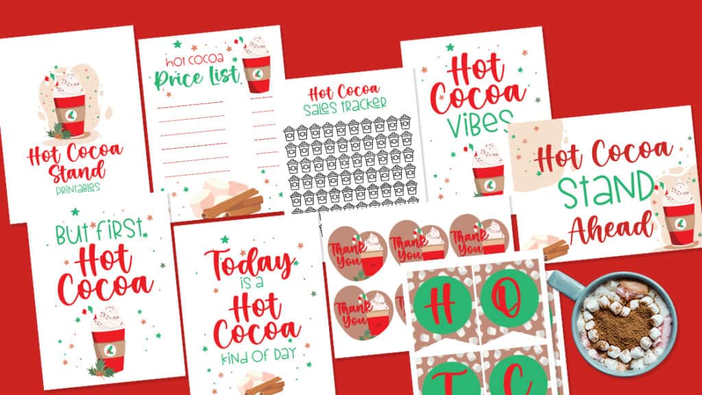 Free printable signs, price list, tracker, tags, and banner for hot cocoa stand in a flat lay design.