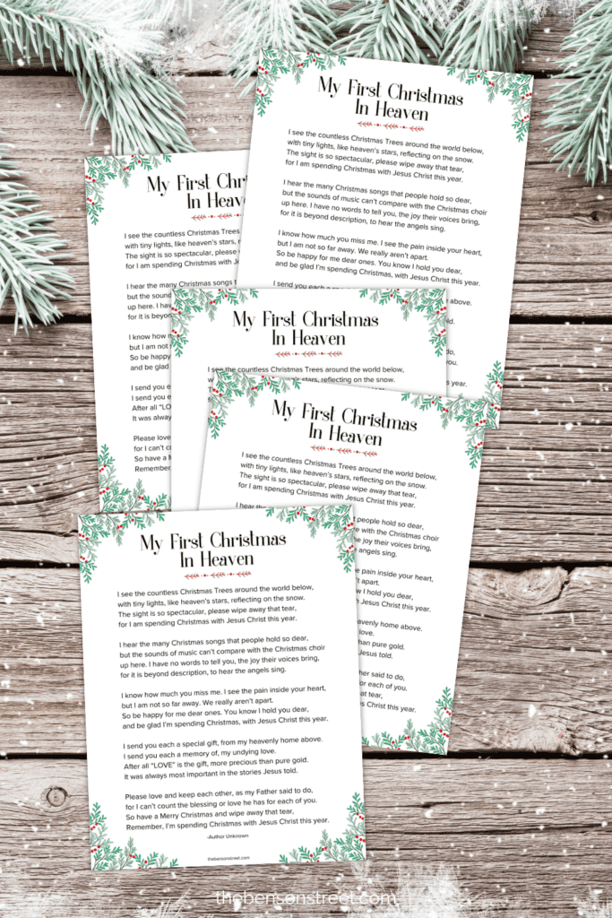 Wood background with five pages printed out laying in a stack on top of each other.