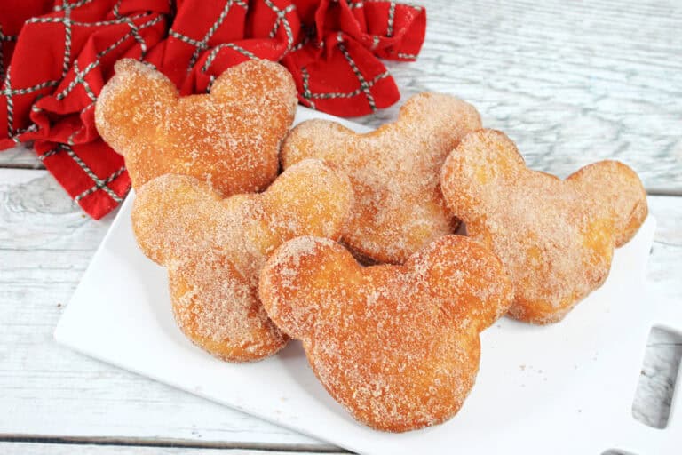 Cinnamon sugar Mickey Beignets on a white napkin
