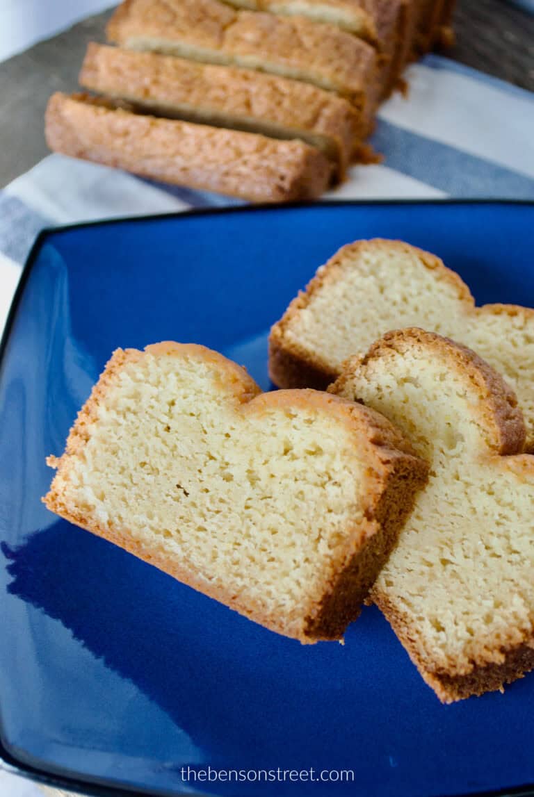 A plate full of slices of almond amish friendship bread loaf cake