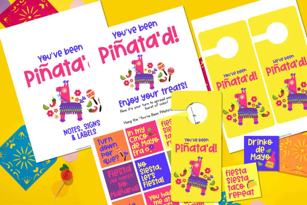 Flat lay You've Been Piñata'd pages with fiesta background.
