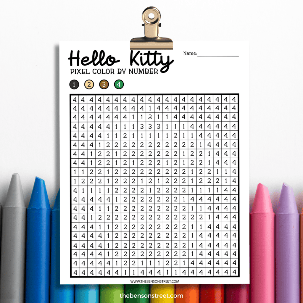 Free Printable Hello Kitty Pixel Color by Number Coloring page on a clipboard with crayons behind it at thebensonstreet.com