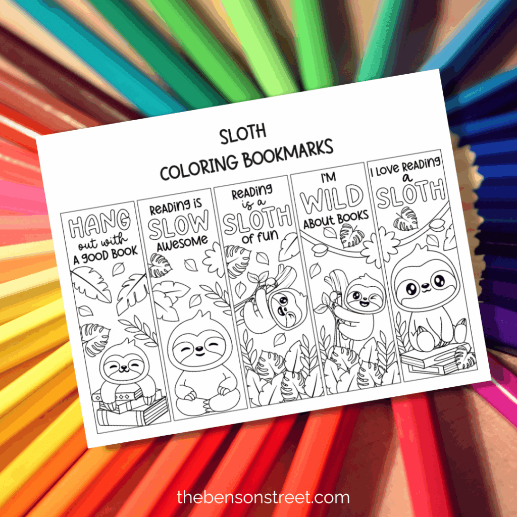 Free Printable sloth coloring bookmarks page on top of coloring pencils background