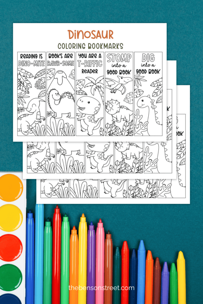Free to print and color in custom dino themed bookmark sheets on top of each other with markers