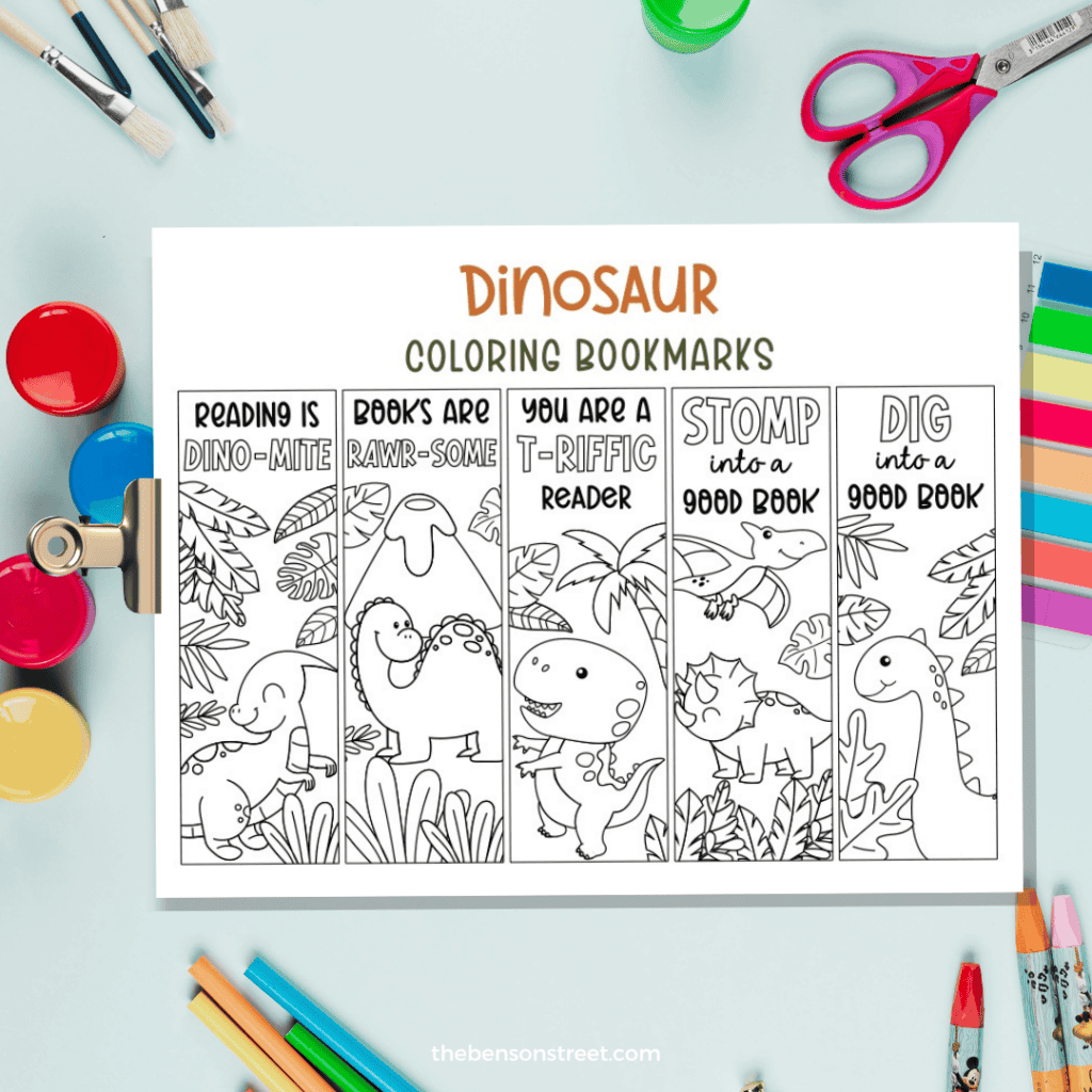 Make your own coloring bookmarks with a dinosaur theme with coloring supplies around the printed out page