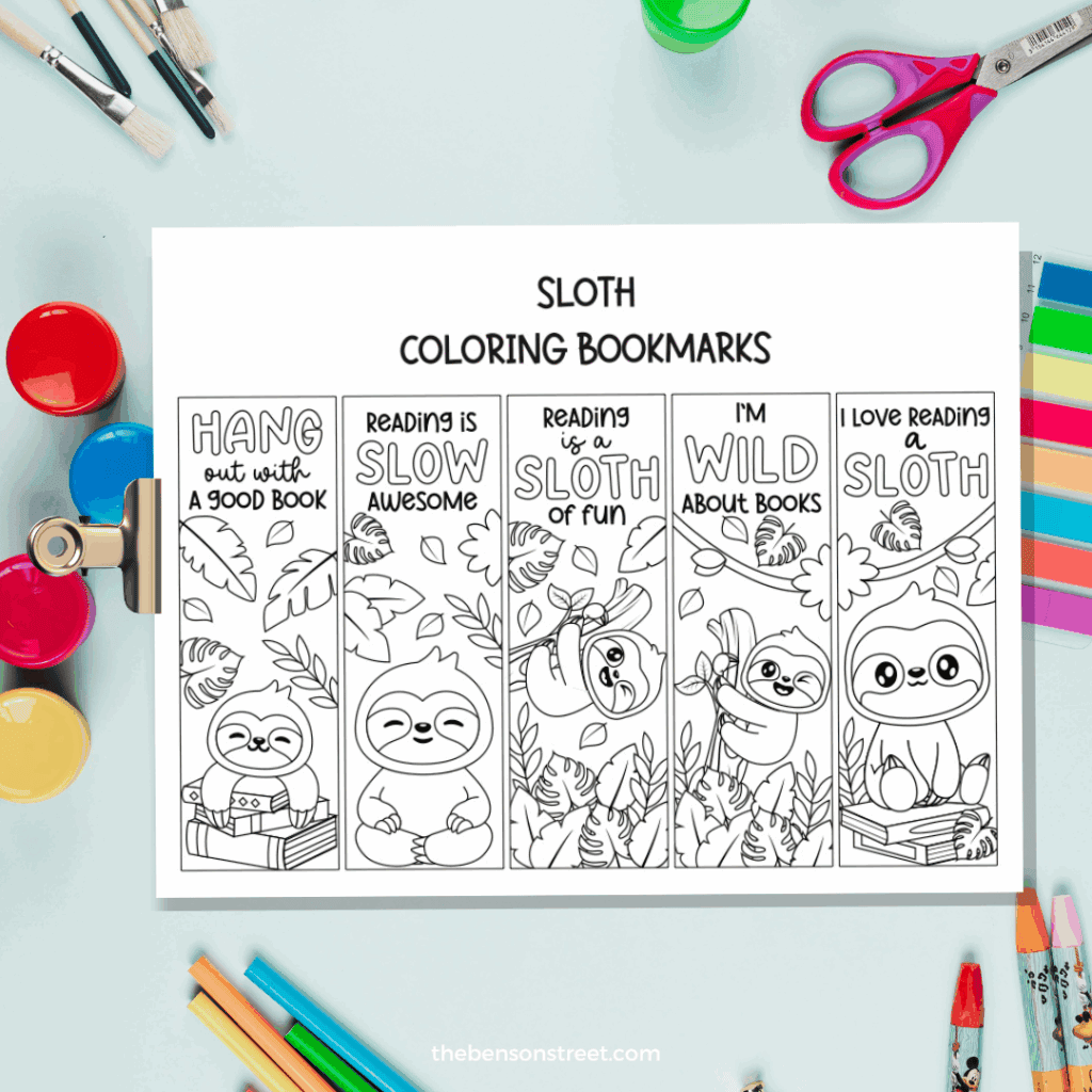 Make your own coloring bookmarks with a sloth theme with coloring supplies around the printed out page
