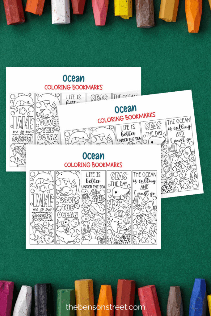 Make your own ocean themed bookmark with this freebie three pages printed out and laying on a green background