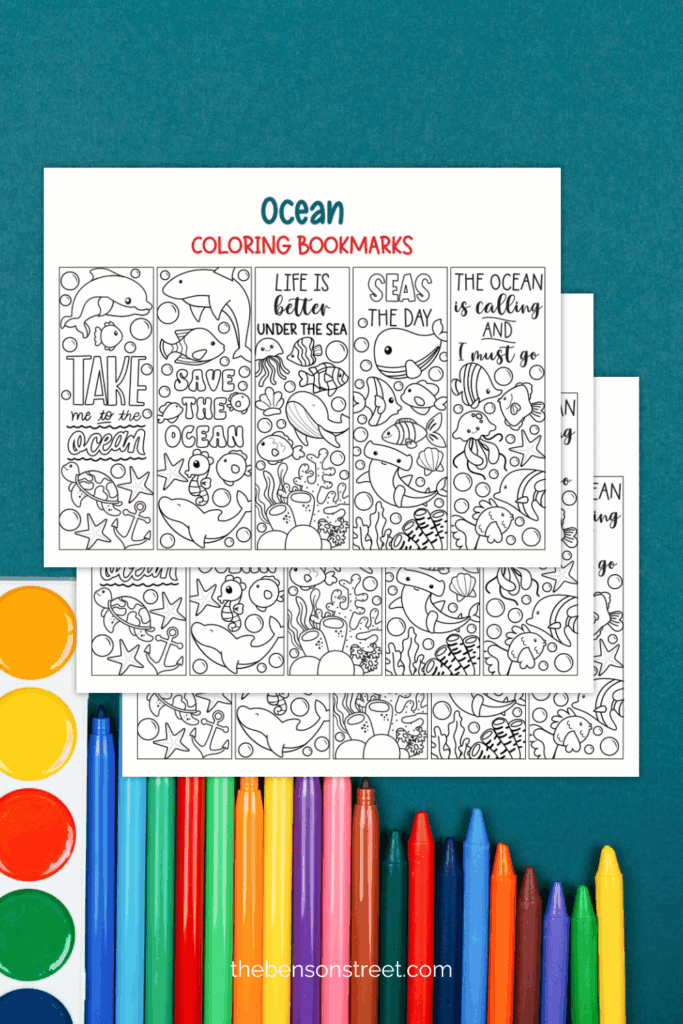 Ocean Coloring Bookmarks sheets ready to color in with markers in the background