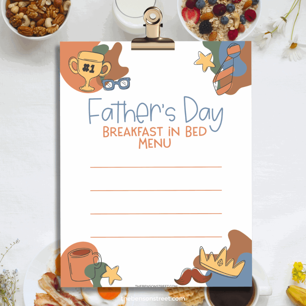 Printable Father's Day Breakfast in Bed Menu on a Clip board with breakfast food around it
