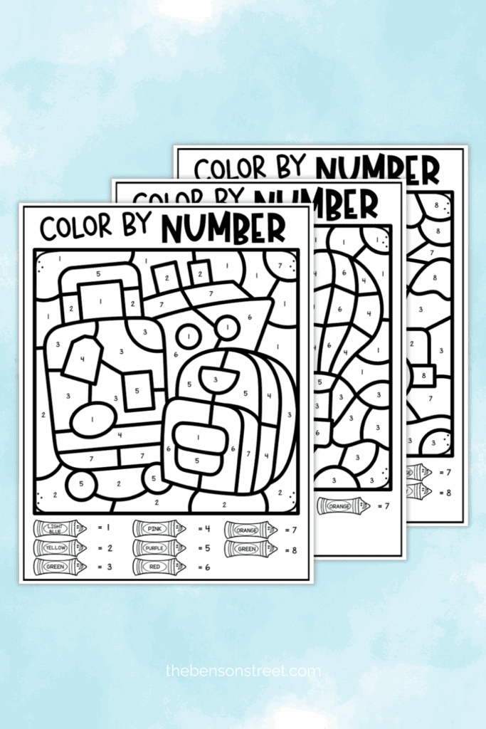 Three color by number black and white sheets ready to color in on a trip