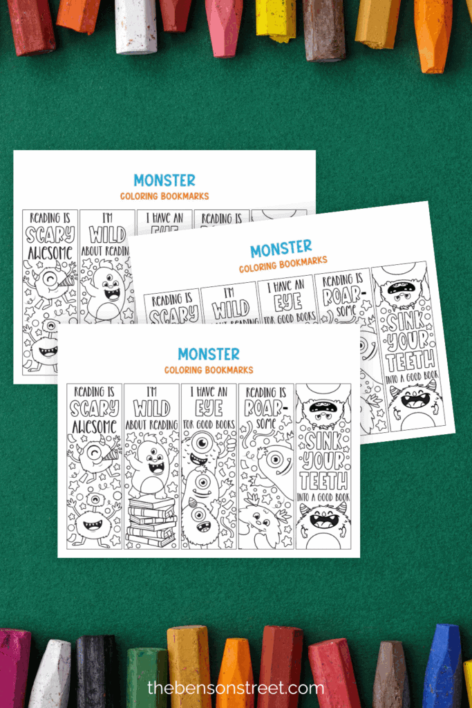 Green background with three pages of monster bookmarks on top