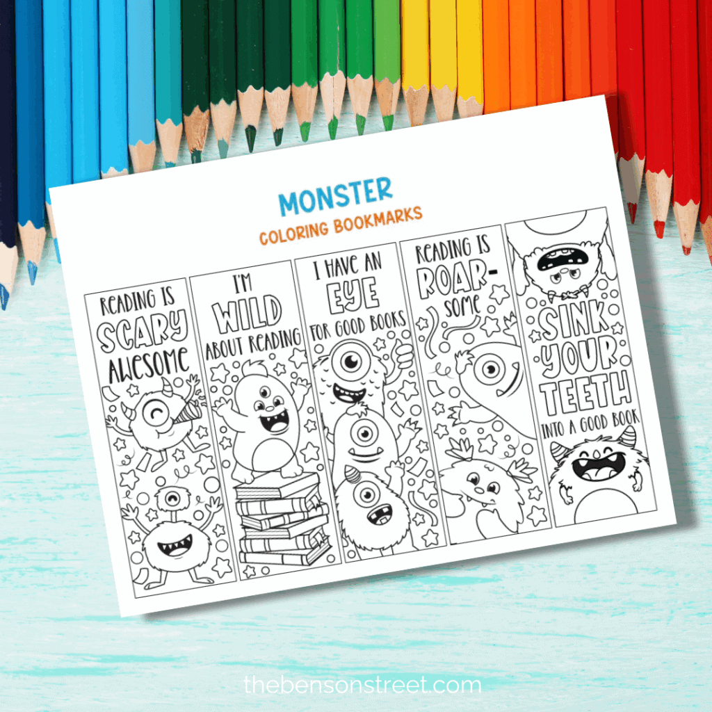 Monster coloring bookmarks with colored pencils in the background
