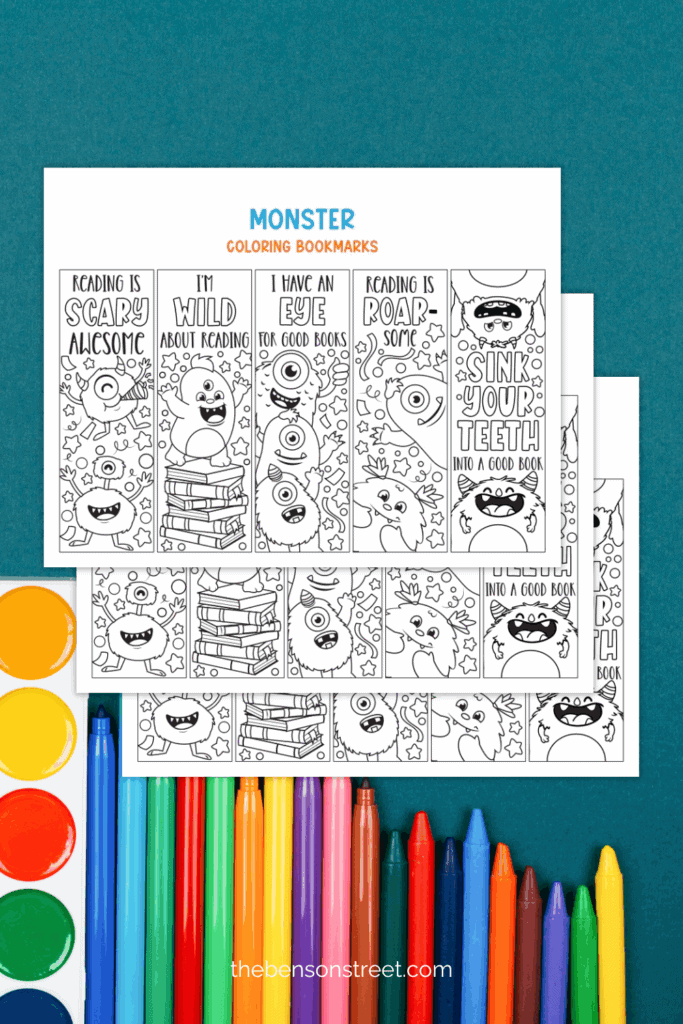 Stack of monster bookmarks to color with coloring supplies