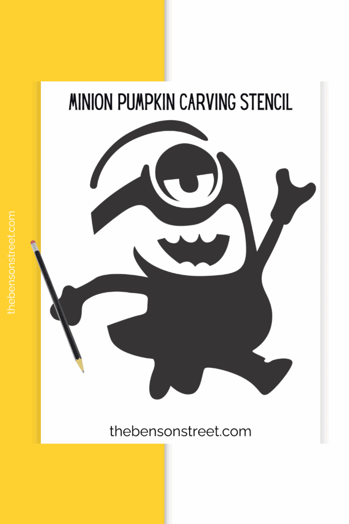 A printed out minion pumpkin carving stencil with a pencil on top