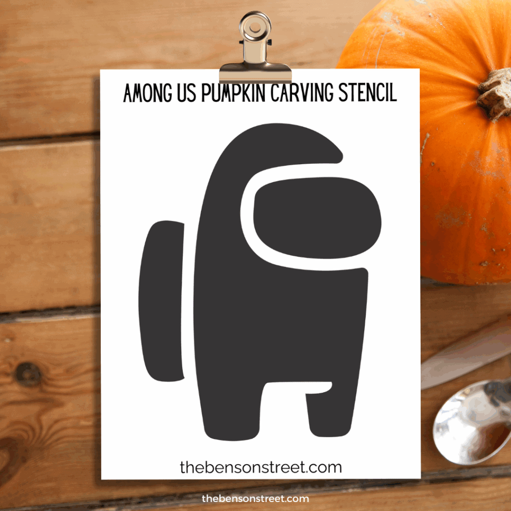 Among Us Pumpkin Carving Stencil template on a clipboard