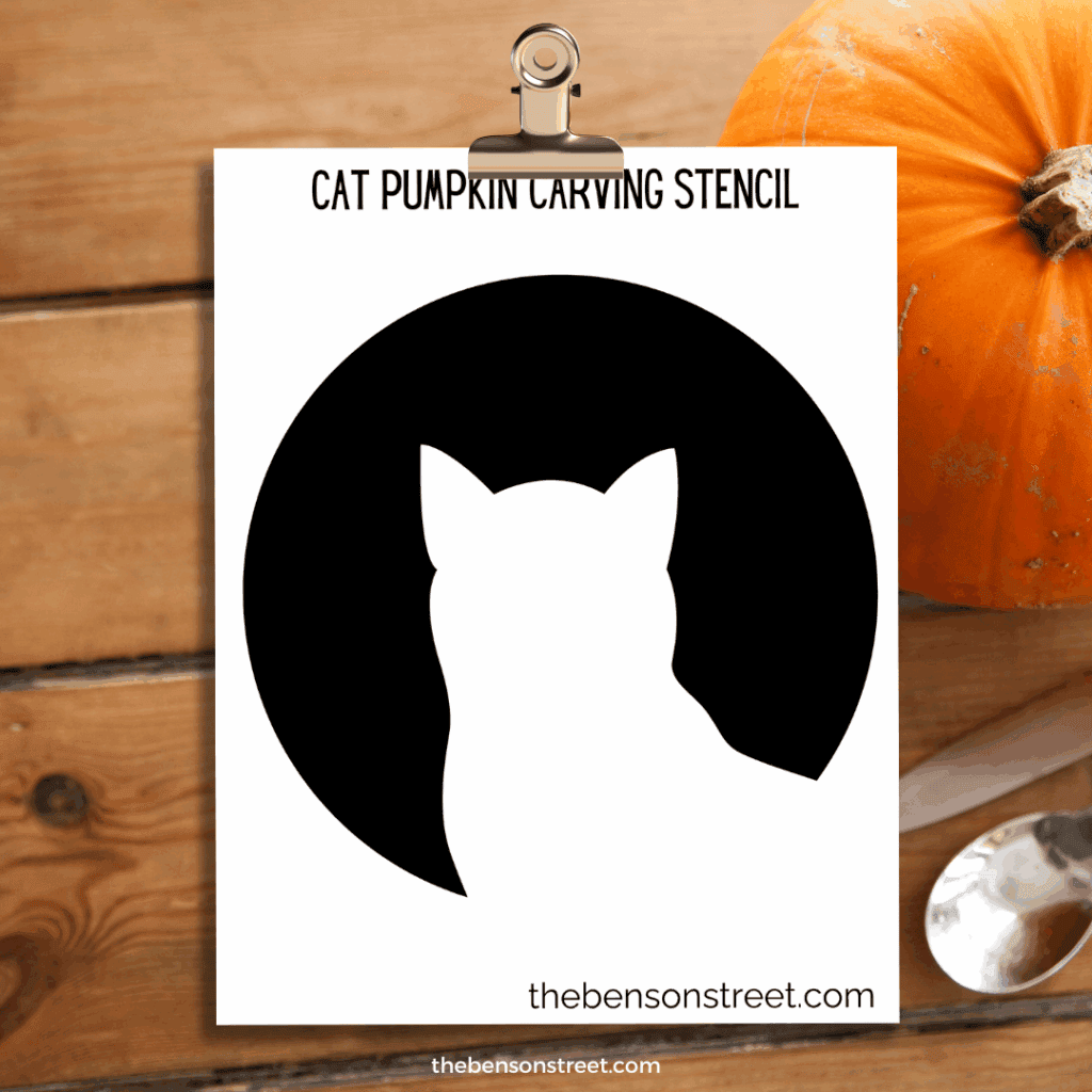Cat Pumpkin Carving Stencil template on a clipboard