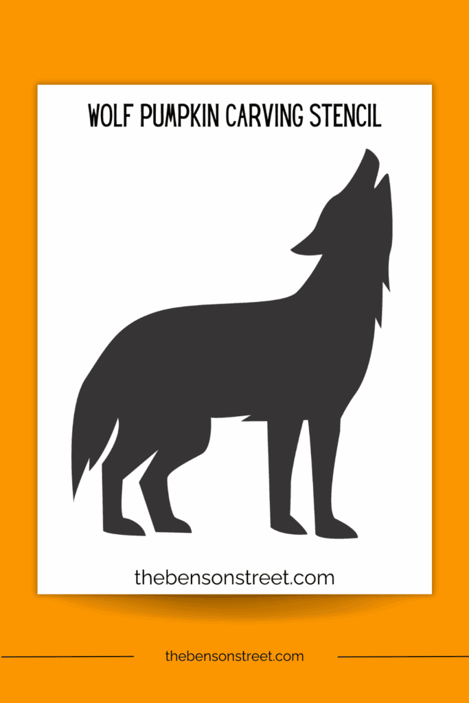 Paper with a pumpkin carving stencil printed on it of a wolf