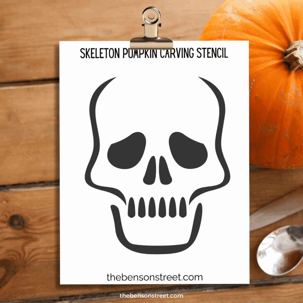 Skeleton Clown Pumpkin Carving Stencil template on a clipboard