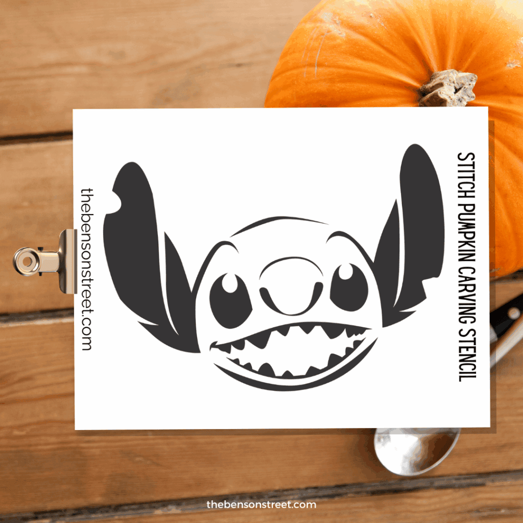 Stitch Alien Face Pumpkin Carving Stencil on a clipboard