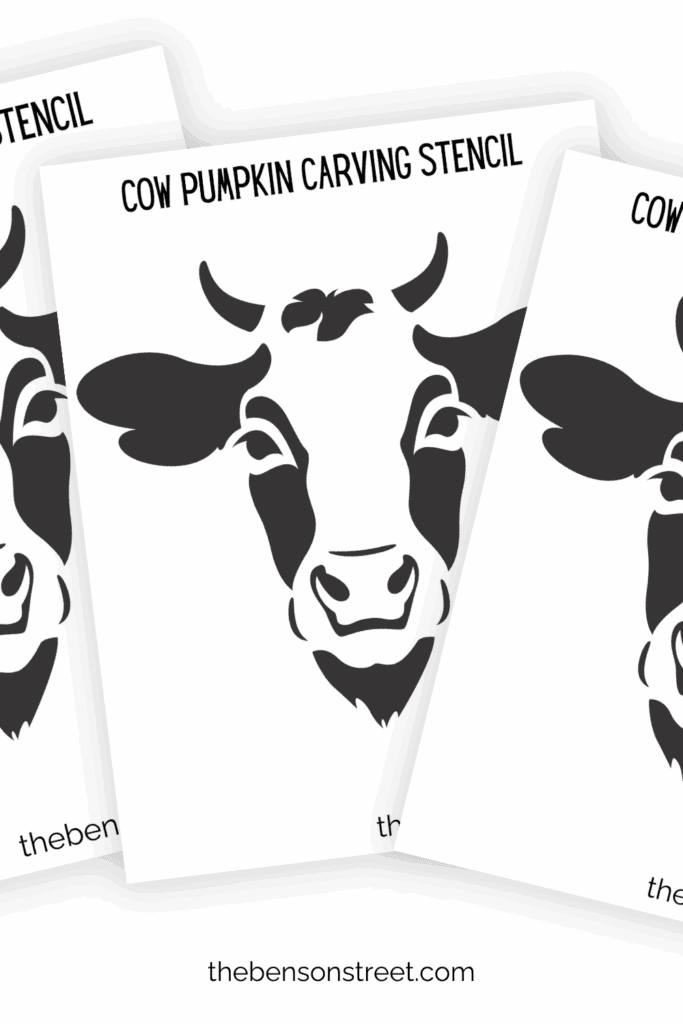 Three printed out pages of cow pumpkin carving stencil papers in a fanned out stack