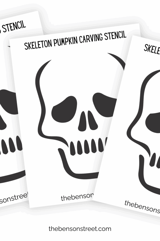 Three sheets of Skeleton pumpkin carving stencil fanned out to make a spooky jack o'lantern