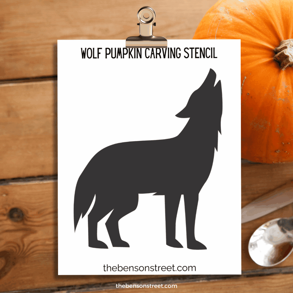 Wolf Pumpkin Carving Stencil template on a clipboard