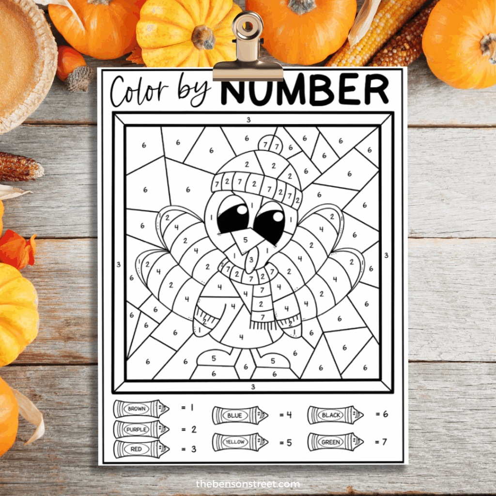 A color by number turkey dressed in winter clothing free printable